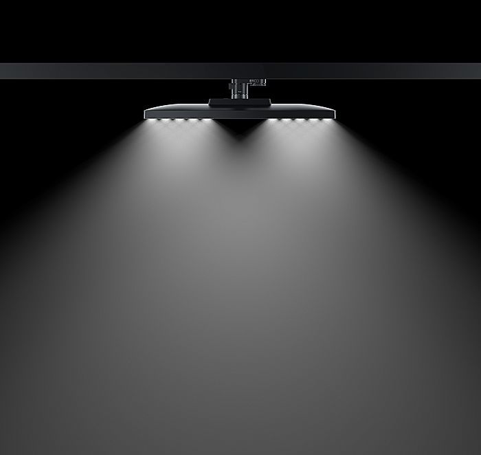 ERCO Jilly downlight illuminating a space, ideal for modern office lighting.