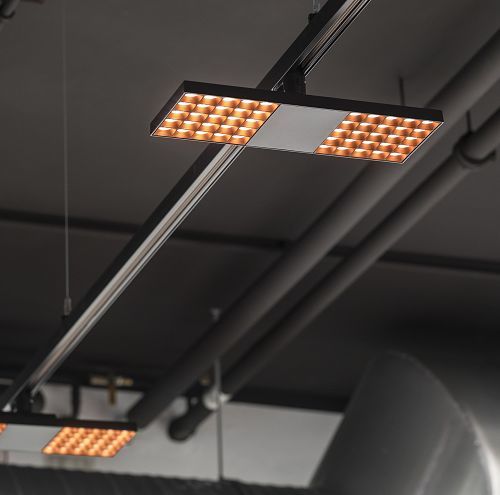ERCO Jilly downlights on track, modern office lighting solution.