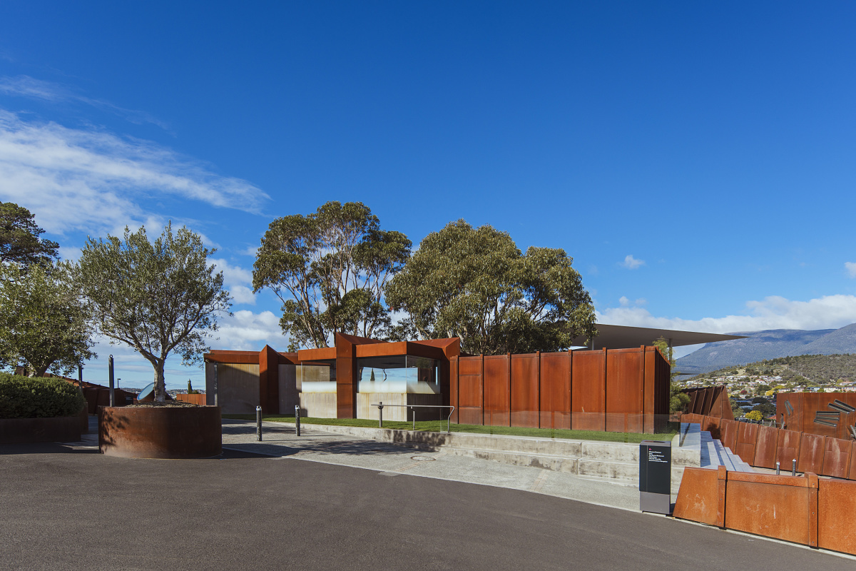 Exterior view of the Mona Museum in Tasmania, featuring ERCO outdoor lighting for guidance.