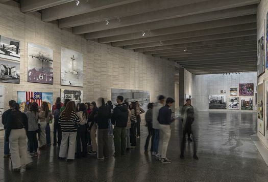 Visitors at Museo Musac, León, illuminated by ERCO LED spotlights on tracks for flexible gallery lighting.