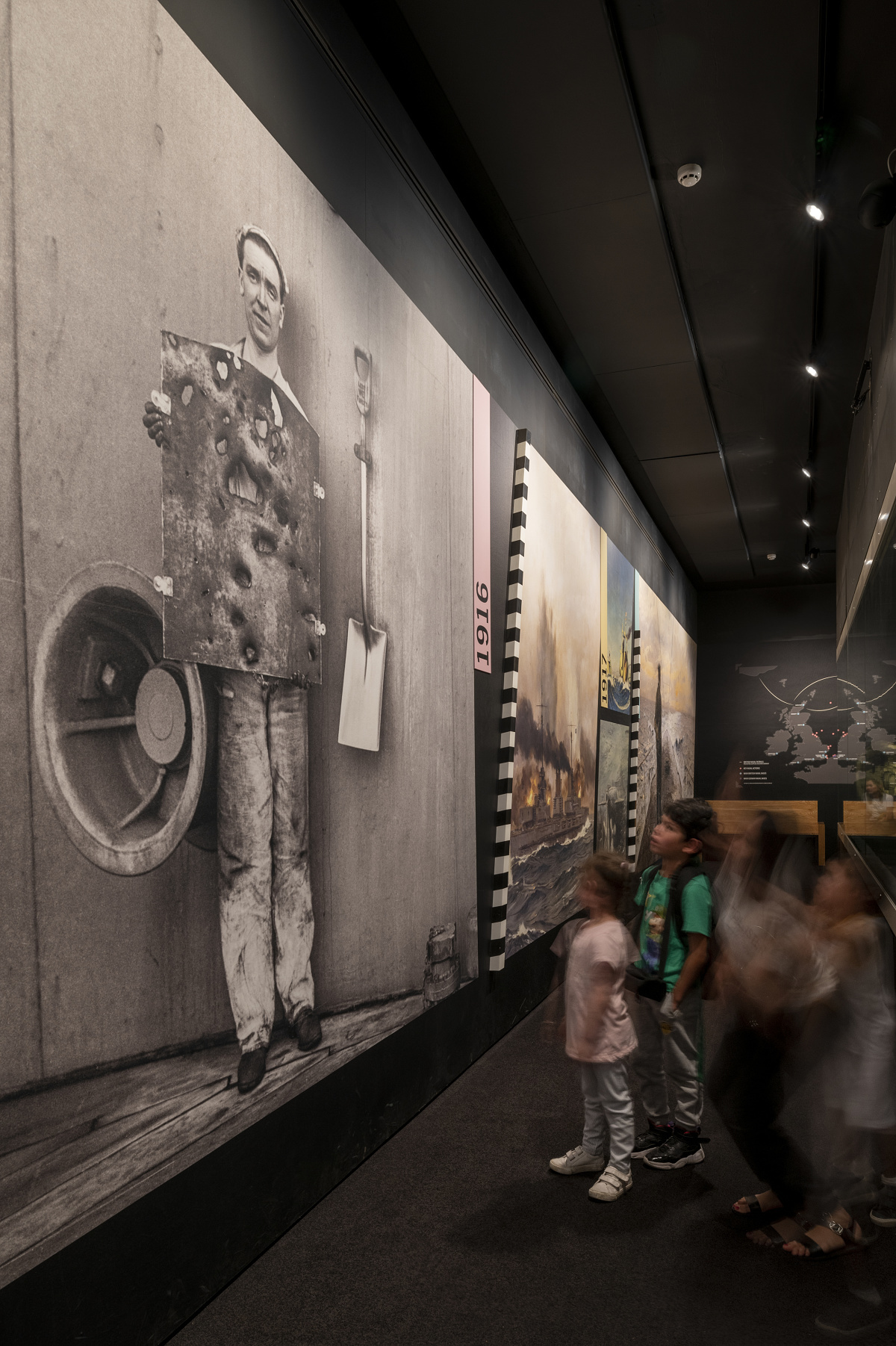 Visitors view an exhibit with LED lighting at the National Maritime Museum, London.