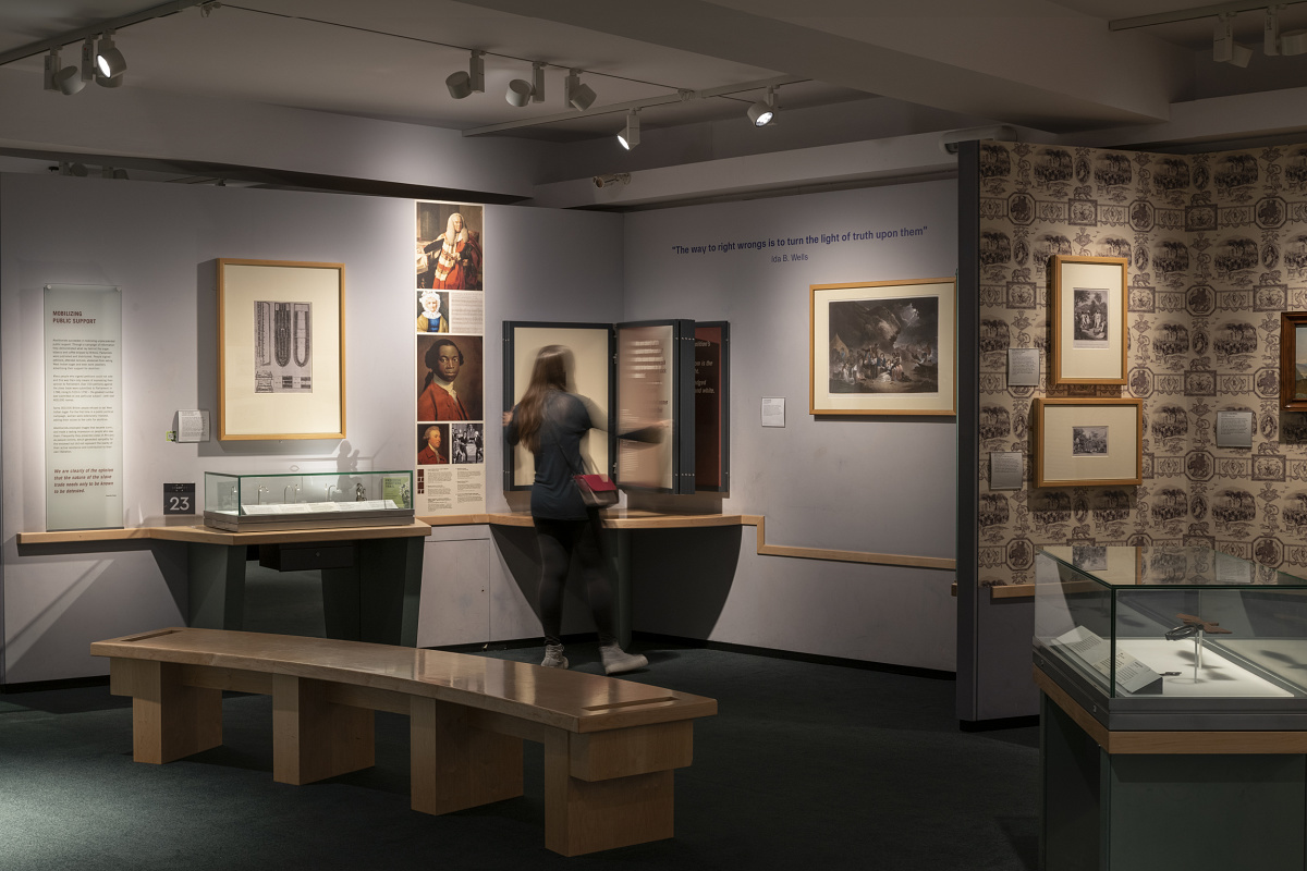 Interior of the National Maritime Museum, London, featuring ERCO LED lighting illuminating historical exhibits.