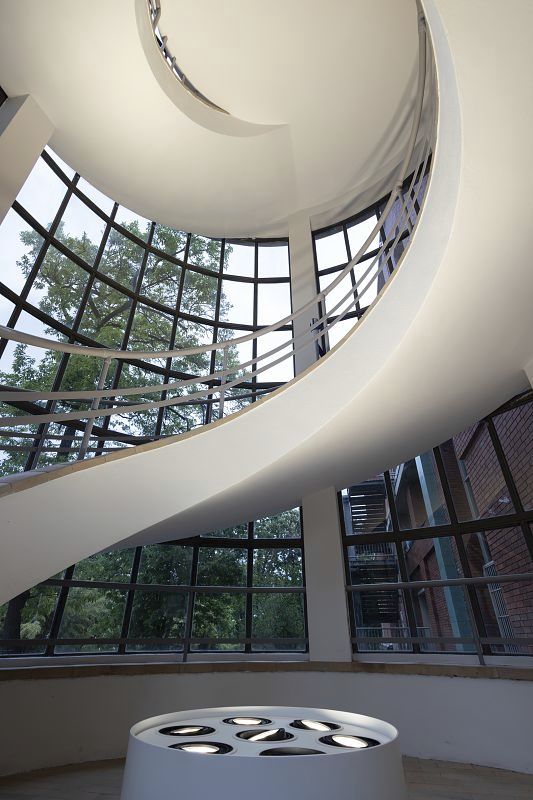 Spiral staircase with ERCO lighting at the Triennale Museum, Milan.
