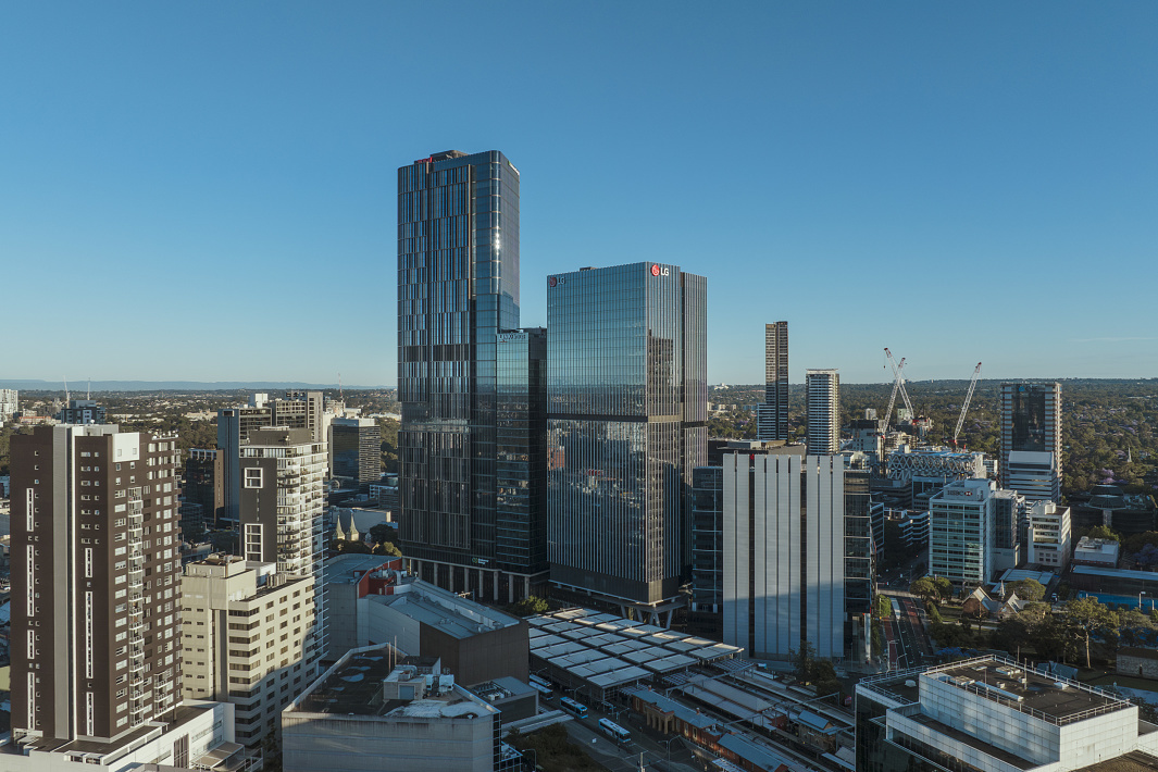Parramatta Square in Sydney, showcasing modern architecture and urban development under a clear sky.