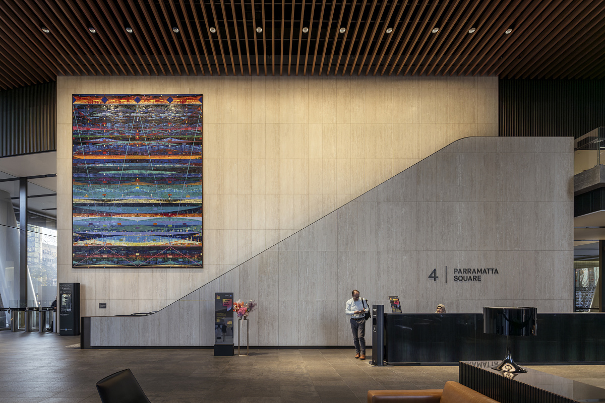 Parramatta Square 4 lobby featuring art and ERCO lighting for a welcoming atmosphere.
