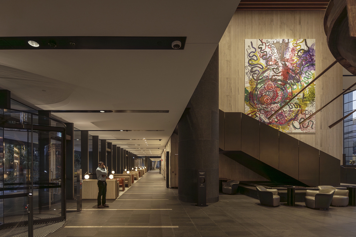 Parramatta Square lobby featuring ERCO lighting and artwork, creating an inviting Sydney atmosphere.