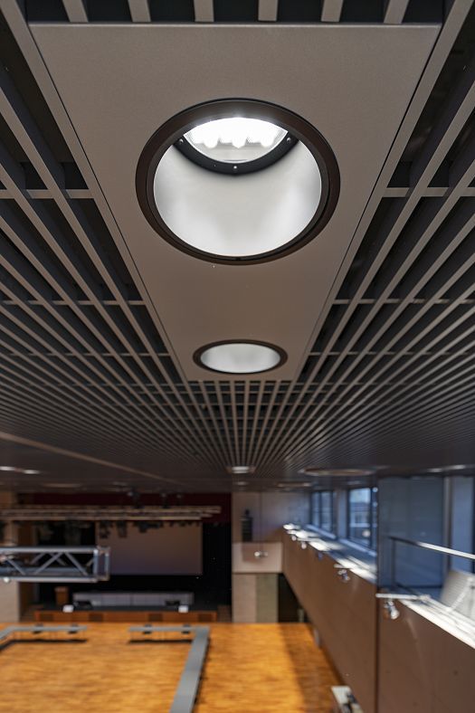 ERCO LED downlights in the Ferry Porsche Congress Center ceiling, providing energy-efficient lighting.