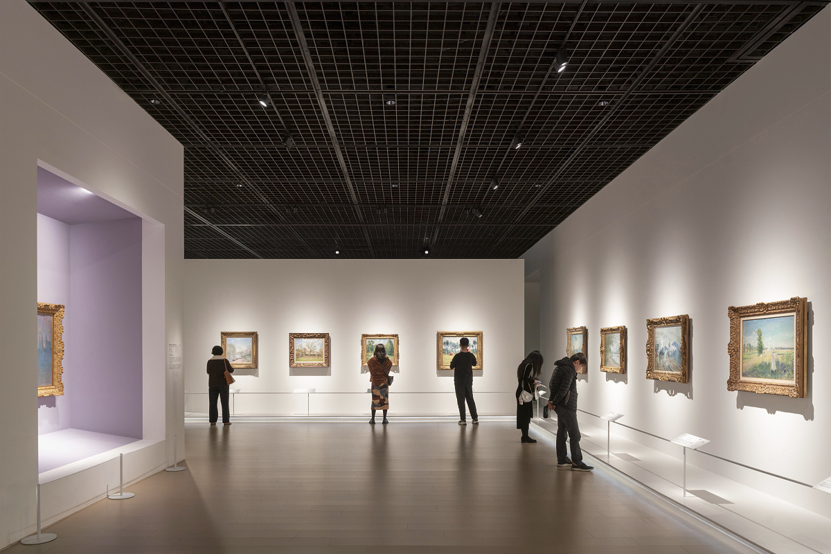 Impressionist paintings illuminated by ERCO spotlights at Shanghai Museum East.