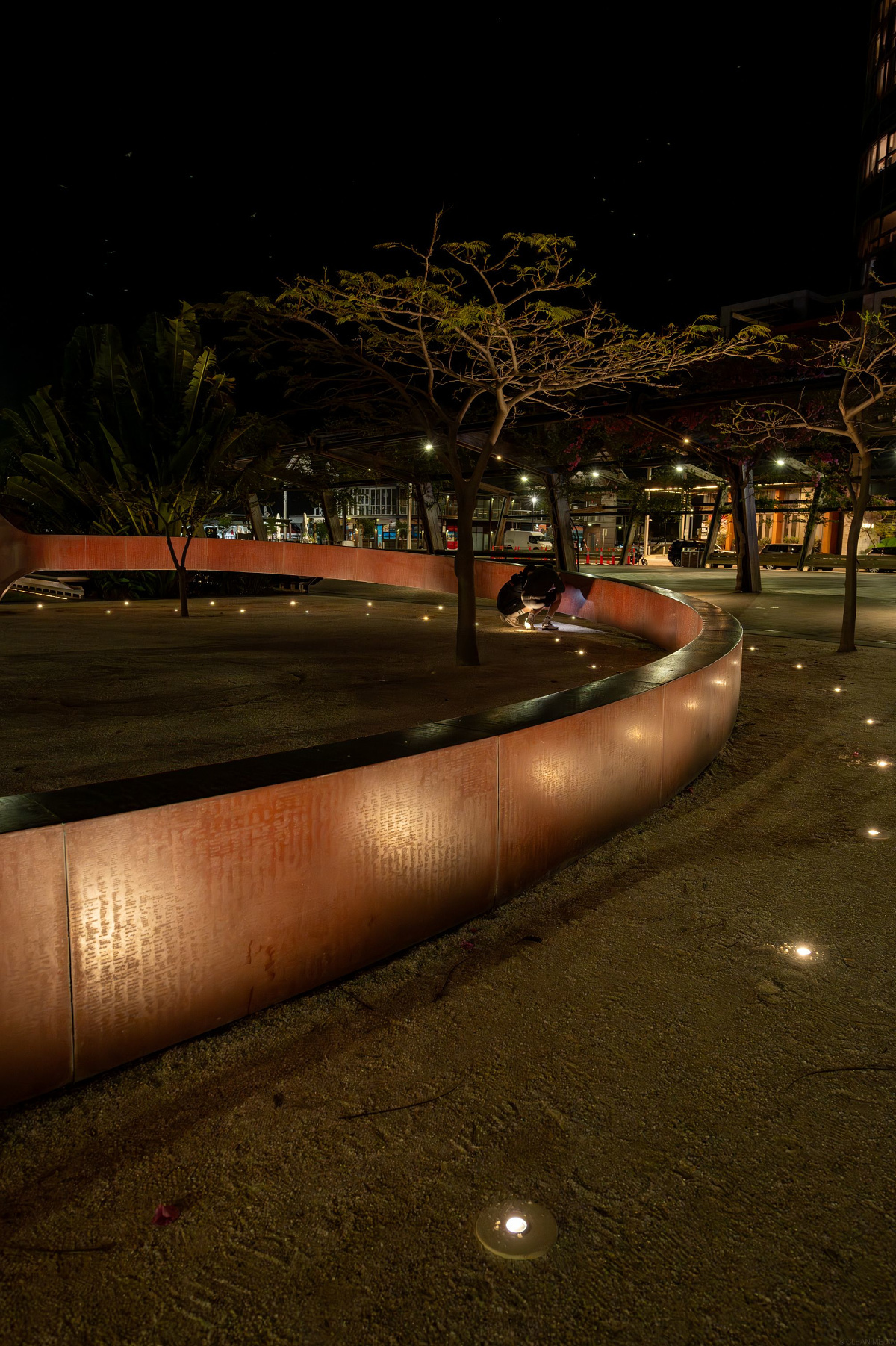 Illuminated Signature Ring at Elizabeth Quay with ERCO Tesis in-ground luminaires at night.