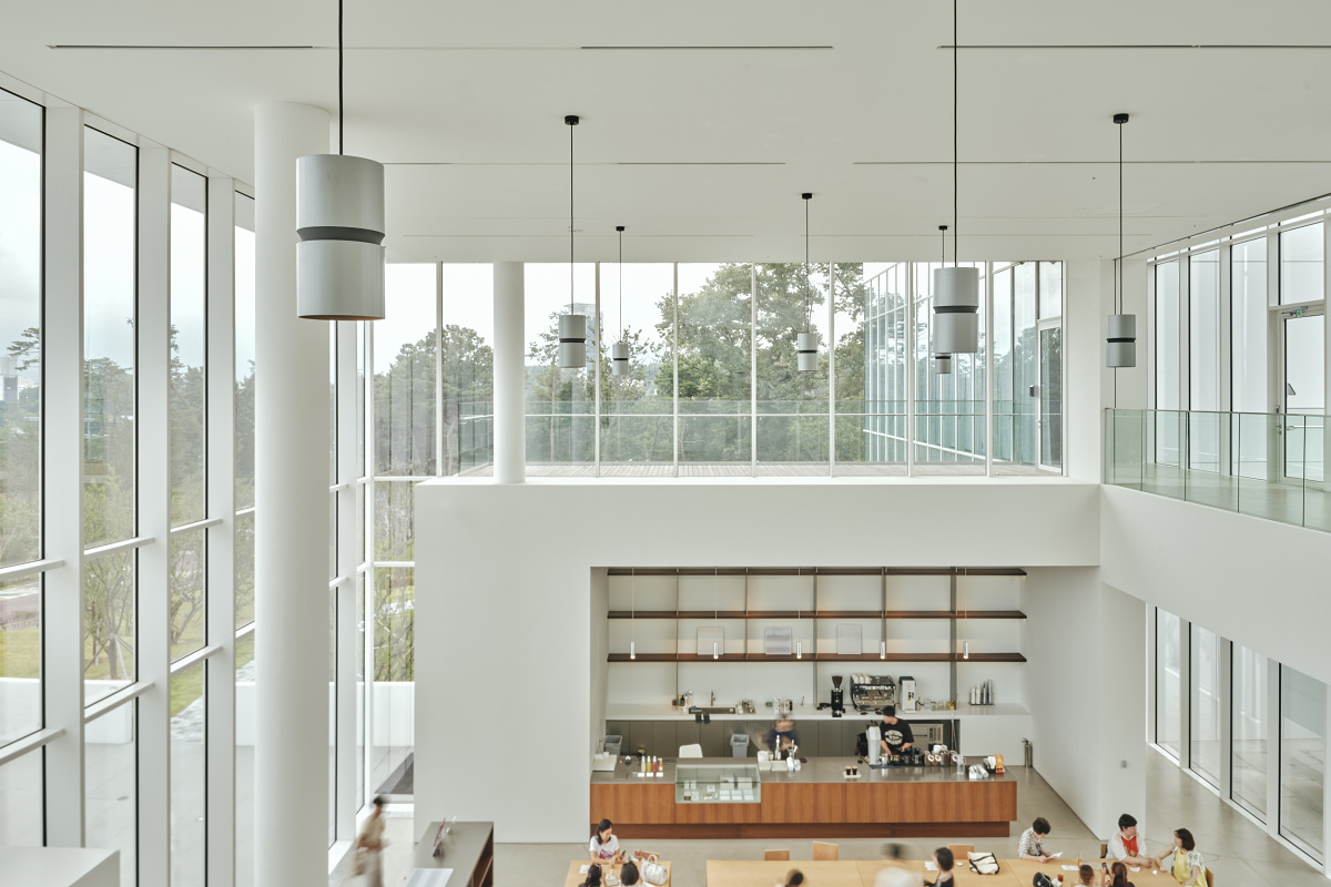 ERCO Atrium pendants in Sorol Art Museum café, Gangneung, providing general lighting and a welcoming atmosphere.