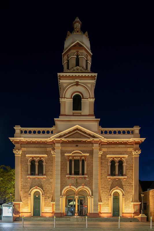 St Andrews Church façade illuminated at night with ERCO Site in-ground grazing light.