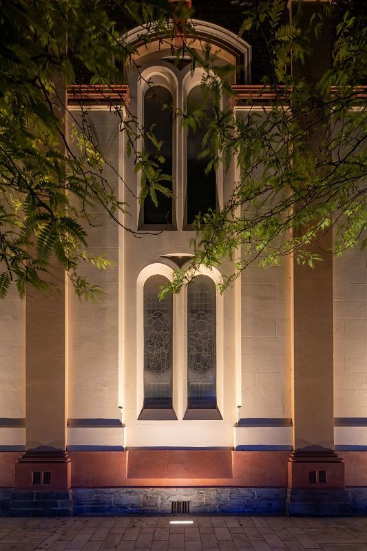 St Andrews Church façade illuminated by ERCO Site in-ground grazing light.