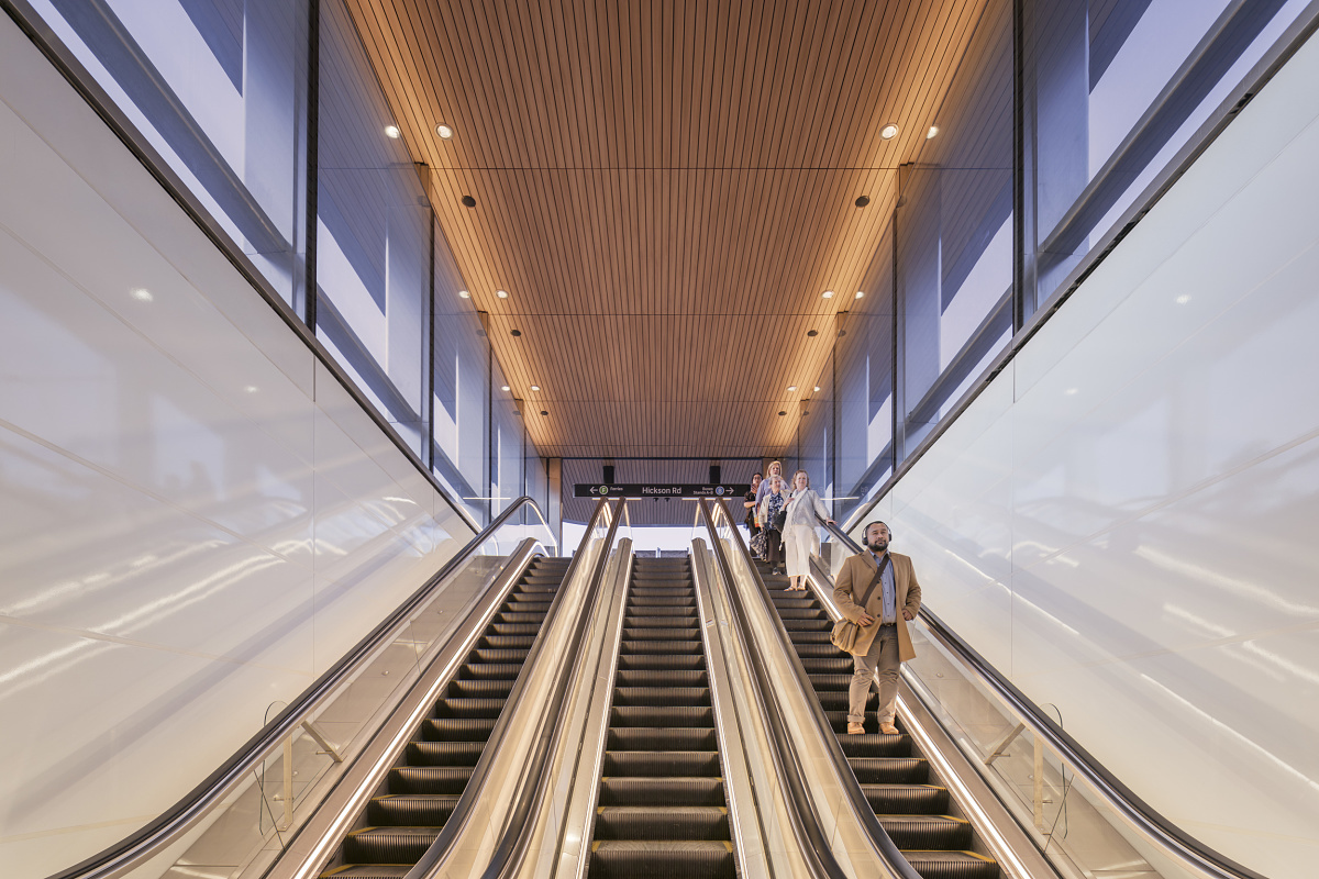 ERCO LED downlights illuminate escalators at Barangaroo Metro Station, Sydney.