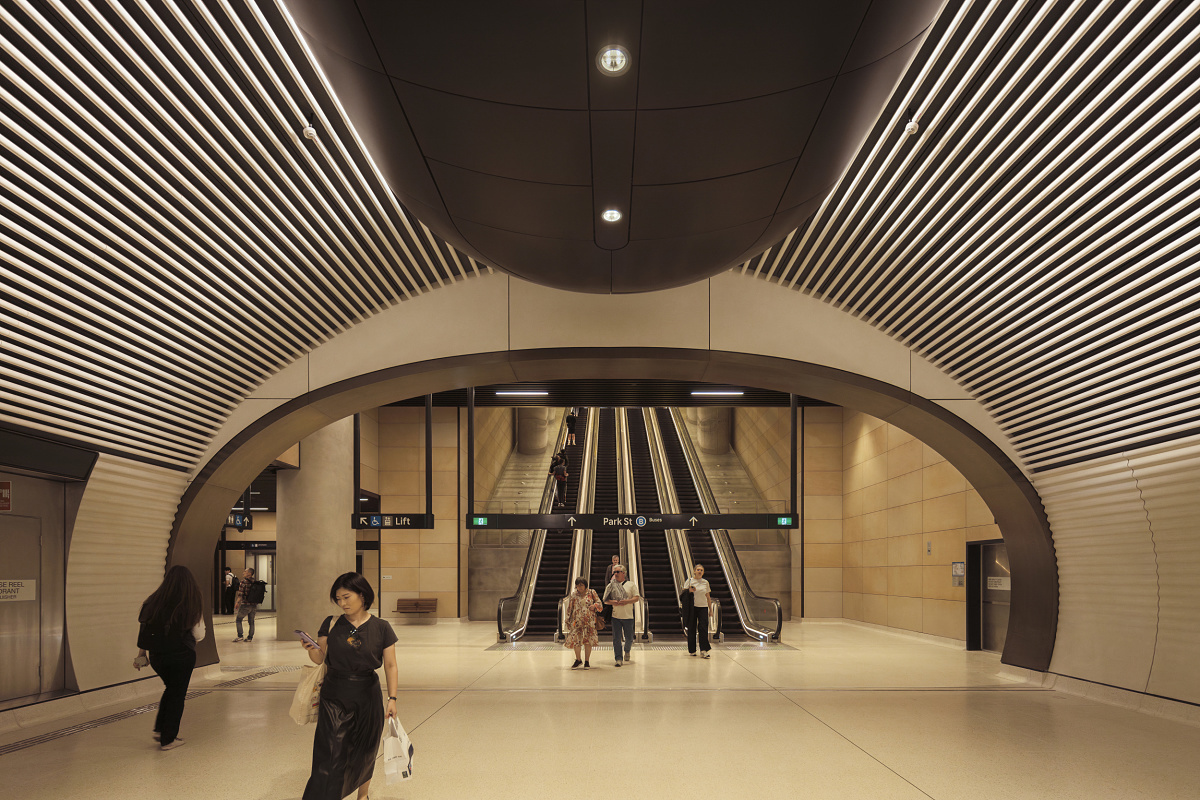 Gadigal Metro Station in Sydney, featuring uniform lighting with ERCO downlights.