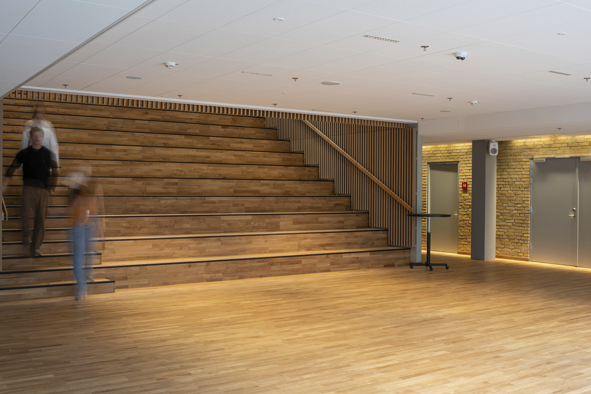 Interior of the Technical University of Denmark featuring stairs and ERCO downlights for LED lighting.