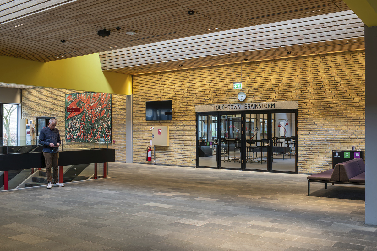 Interior of the Technical University of Denmark featuring LED downlights and wallwashing.