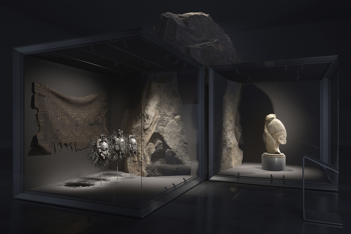 Museum exhibit featuring ERCO lighting: African art objects in display cases, illuminated by a 48V low voltage system.