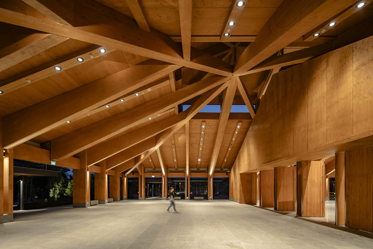 ERCO LED lighting at The Guesthouse, Singapore, showcasing timber structure and event lighting.