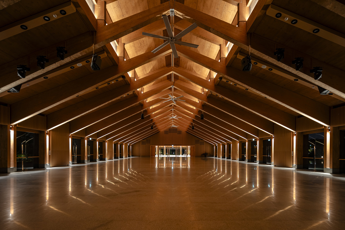The Guesthouse Singapore interior featuring ERCO LED lighting accentuating the timber structure.