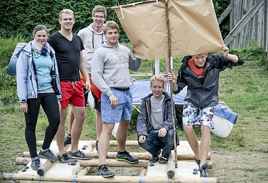 ERCO apprentices building a raft, showcasing teamwork and practical training fun.