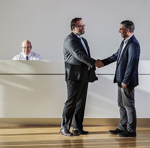 ERCO Supplier Relationship Management: A handshake symbolizes successful partnership.