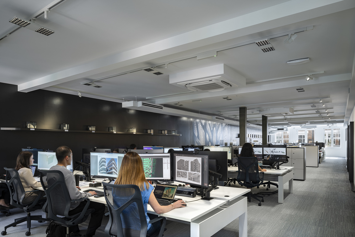 ERCO LED lighting in Zaha Hadid's London office, supporting modern, flexible workspace design.