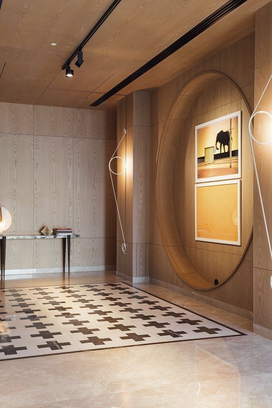 ERCO Optec spotlights illuminate art in Zydus Cadila office, Ahmedabad. Accent lighting enhances visual comfort.