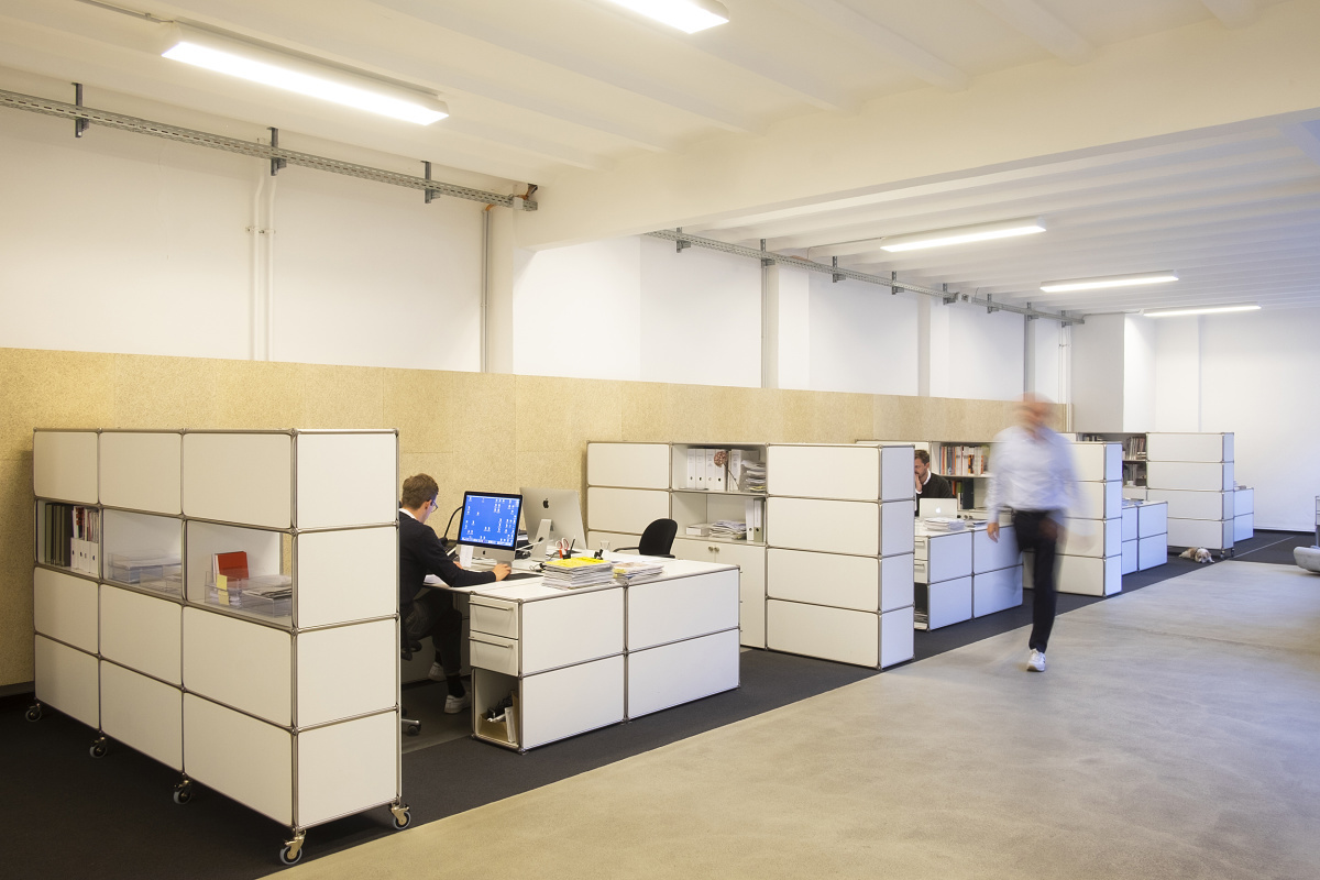 Office with LED lighting after T5/T8 ban, showcasing energy-efficient workplace illumination.